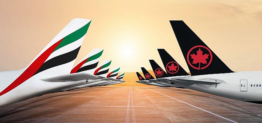 emirates-ve-air-canada-global-ucus-aglarini-genisletmek-ve-musteri-deneyimini-gelistirmek-icin-ortak-ucus-anlasmasini-faaliyete-gecirdi.jpg