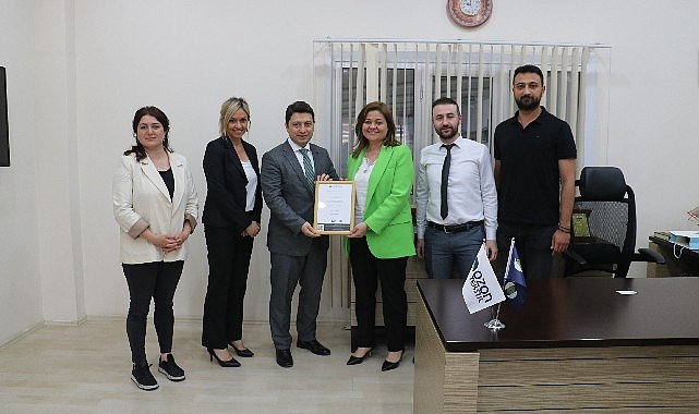 ozon-tekstil-ck-enerji-camlibel-elektrik-araciligi-ile-yesil-enerji-sertifikasi-aldi.jpg